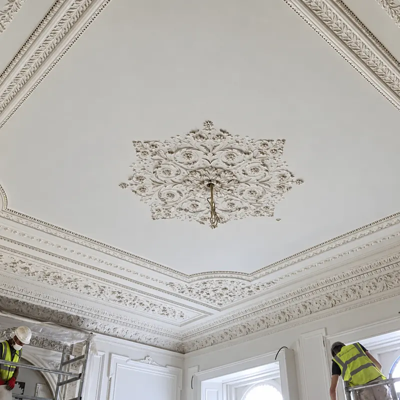 Restored ornate plaster ceiling and cornice in a London dining room decorated by Whitecrest