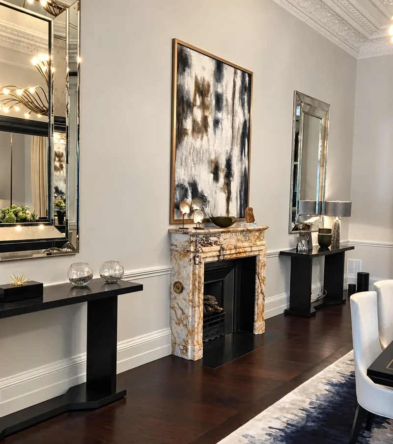Marble fireplace and mirrored panelling